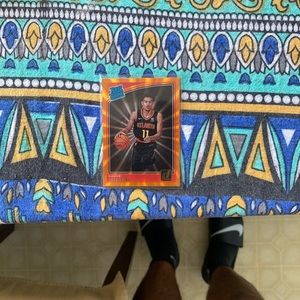 Trae young rookie card orange laser